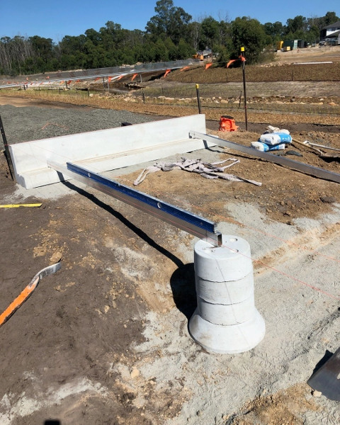 Precast abutment and piers placed onto a compacted base.