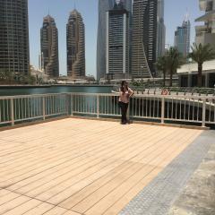 Promenade next to water in city