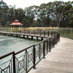 concrete boardwalk with a steel balustrade